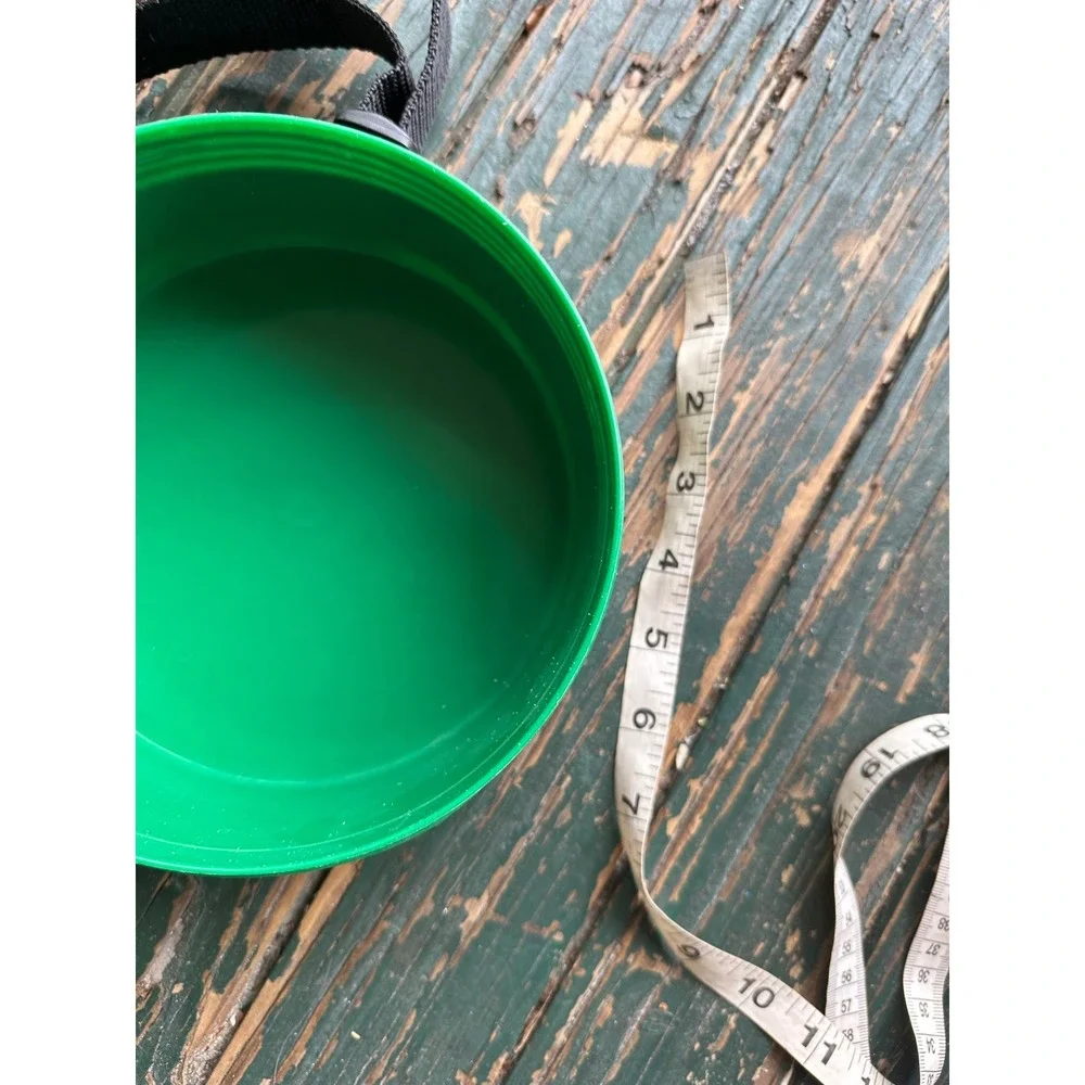 Green Plastic Round Storage Canister with Carrying Strap and Screw Lid